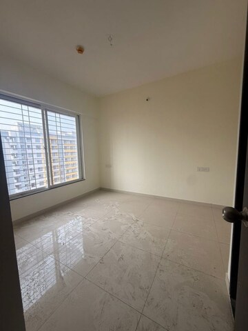 Master Bedroom in 2 BHK Apartment at Kolte Patil R10, Hinjewadi – for Rent