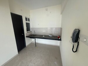 Kitchen in 2 BHK Apartment at Kolte Patil R10, Hinjewadi – for Rent