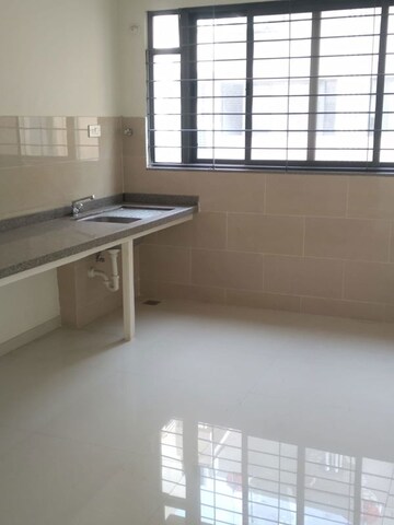 Kitchen in 2 BHK Apartment at Kumar Palmspring Towers, Undri – for Sale