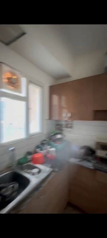 Kitchen in 2 BHK Apartment at Gaur Atulyam Gravity, Omicron I Greater Noida – for Rent