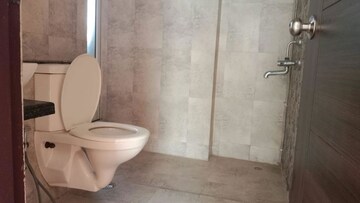 Bathroom in 3 BHK Apartment at Mahagun Mirabella Highrise, Sector 79 – for Sale