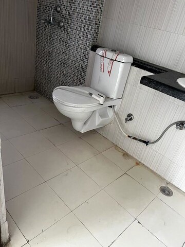 Bathroom in 3 BHK Apartment at Mahagun Mirabella Highrise, Sector 79 – for Sale