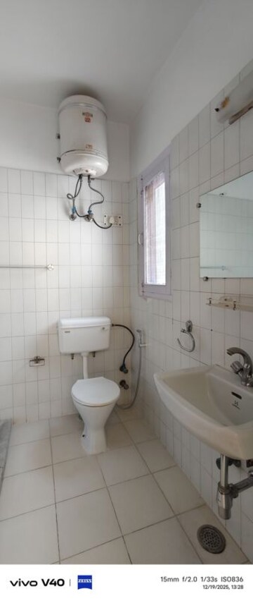 Bathroom in 2.5 BHK Apartment at Defence Colony – for Rent