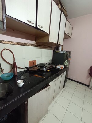 Kitchen in 2 BHK Apartment at RNA Heights, Andheri East – for Sale