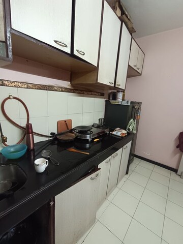 Kitchen in 2 BHK Apartment at RNA Heights, Andheri East – for Sale