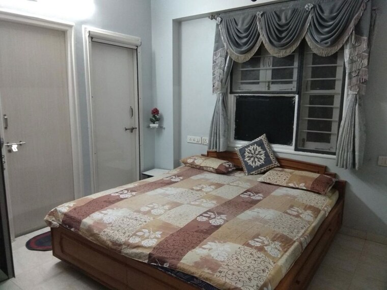 Bedroom, satyam-apartments-jodhpur 2 Bedroom 1255 Sq.Ft. Apartment In Jodhpur Ahmedabad 9852844