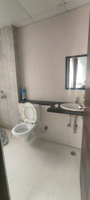 Bathroom in 3 BHK Apartment at Mahagun Mirabella, Sector 79 – for Sale
