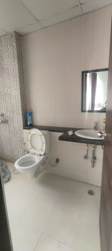 Bathroom in 3 BHK Apartment at Mahagun Mirabella, Sector 79 – for Sale
