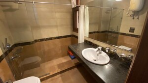 Bathroom in 4 BHK Builder Floor at South Extension I – for Rent