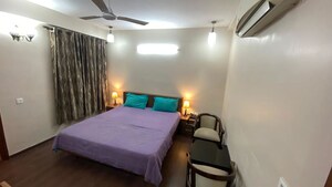 Bedroom in 4 BHK Builder Floor at South Extension I – for Rent