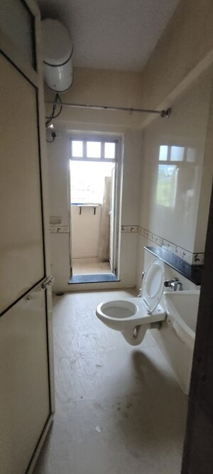 Bathroom in 2 BHK Apartment at K Raheja Heights, Malad East – for Rent