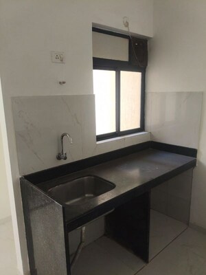 Kitchen in 1 BHK Apartment at Runwal Gardens Phase I, Dombivli East – for Rent