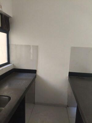 Kitchen in 1 BHK Apartment at Runwal Gardens Phase I, Dombivli East – for Rent