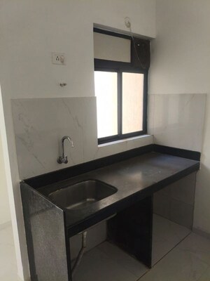Kitchen in 1 BHK Apartment at Runwal Gardens Phase I, Dombivli East – for Rent