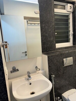 Bathroom in 2 BHK Apartment at Rustomjee Urbania Azziano, Thane West – for Rent