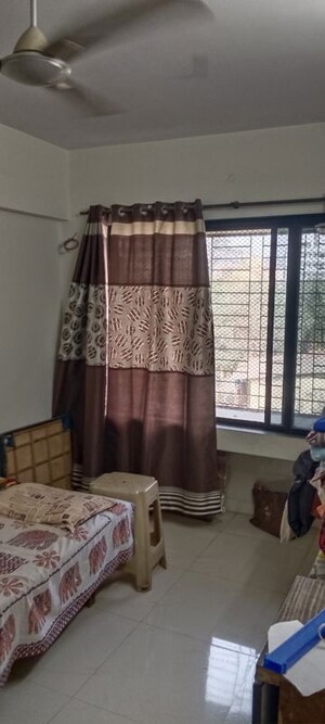 Living Room in 2 BHK Apartment at Kalyan West – for Sale