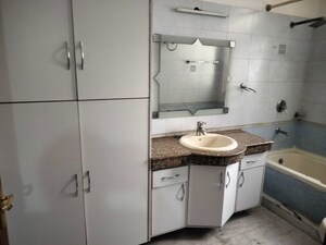 Bathroom in 3 BHK Apartment at Defence Colony – for Rent
