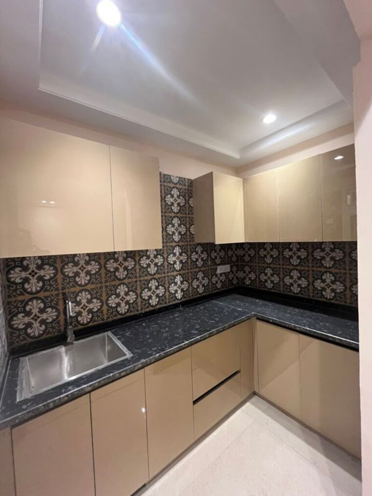 Kitchen, risland-sky-mansion 2 Bedroom 1000 Sq.Ft. Apartment In Chattarpur Delhi 9853444