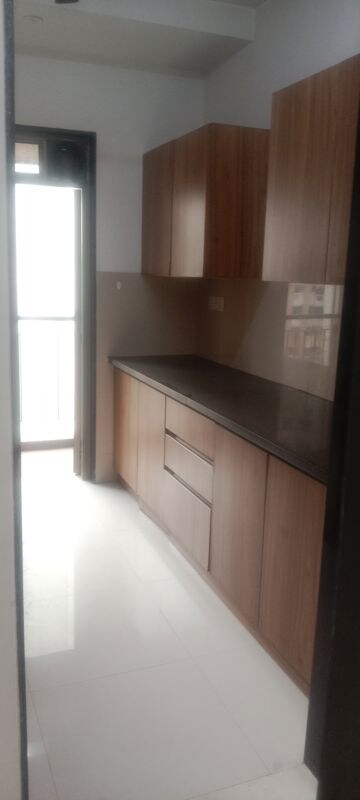 Kitchen in 2.5 BHK Apartment at Lodha Splendora, Ghodbunder Road – for Rent