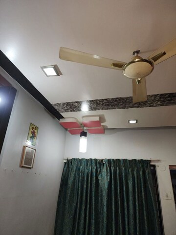 Living Room in 2 BHK Apartment at Bhusari Colony – for Sale