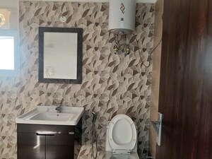 Bathroom in 3.5 BHK Apartment at Elite Golf Green, Sector 79 – for Rent