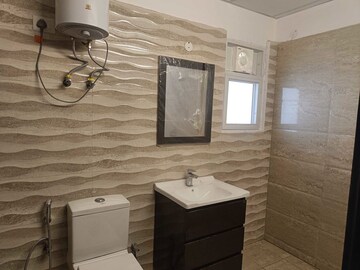 Bathroom in 3.5 BHK Apartment at Elite Golf Green, Sector 79 – for Rent