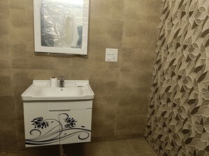 Bathroom in 2 BHK Apartment at Elite Golf Green, Sector 79 – for Sale