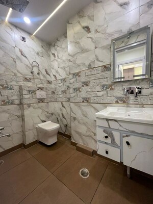 Bathroom in 3 BHK Builder Floor at Dwarka Mor – for Rent