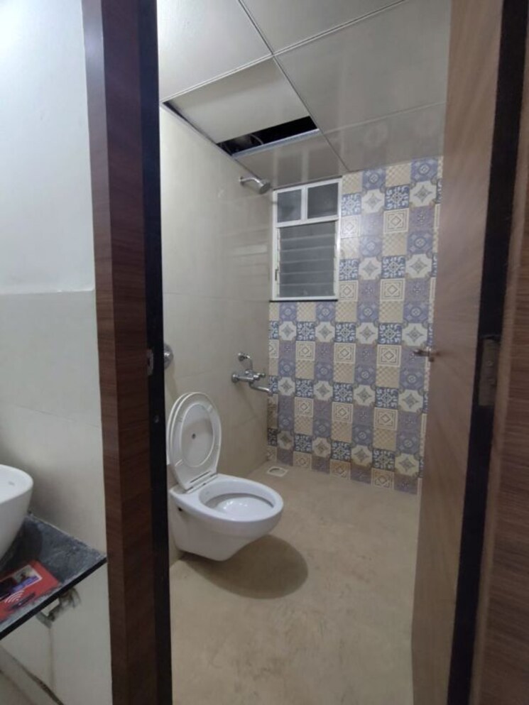 Bathroom, saheel-itrend-life-3 2 Bedroom 710 Sq.Ft. Apartment In Wakad Pune 9853687