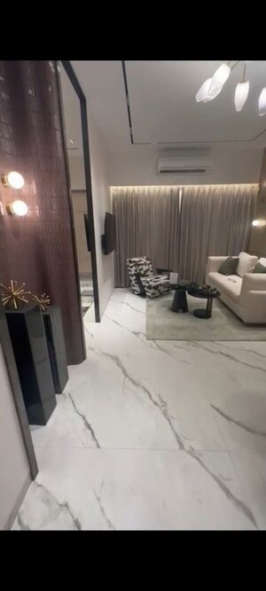 Living Room in 2 BHK Apartment at Beauty Greenstone Heritage, Fort – for Sale