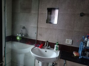 Bathroom in 2.5 BHK Apartment at Amrapali Silicon City, Sector 76 – for Sale