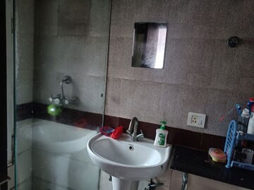 Bathroom in 2.5 BHK Apartment at Amrapali Silicon City, Sector 76 – for Sale