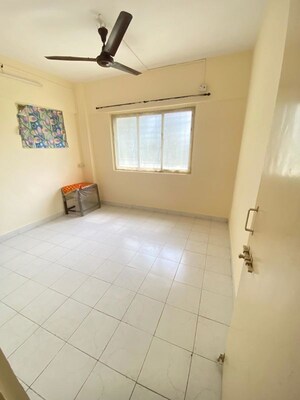 Room in 2 BHK Apartment at New Gokul Plaza CHS, Kandivali East – for Rent