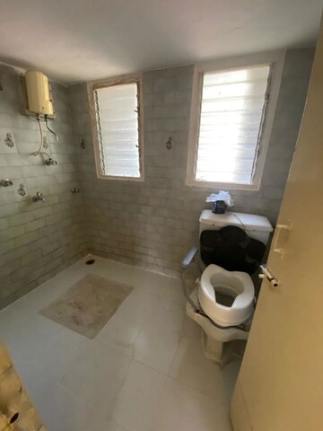 Bathroom in 2 BHK Apartment at New Gokul Plaza CHS, Kandivali East – for Rent