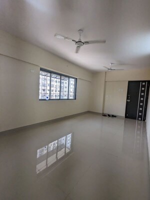 Room in 2 BHK Apartment at Swapnapurti CHS, Goregaon West – for Rent
