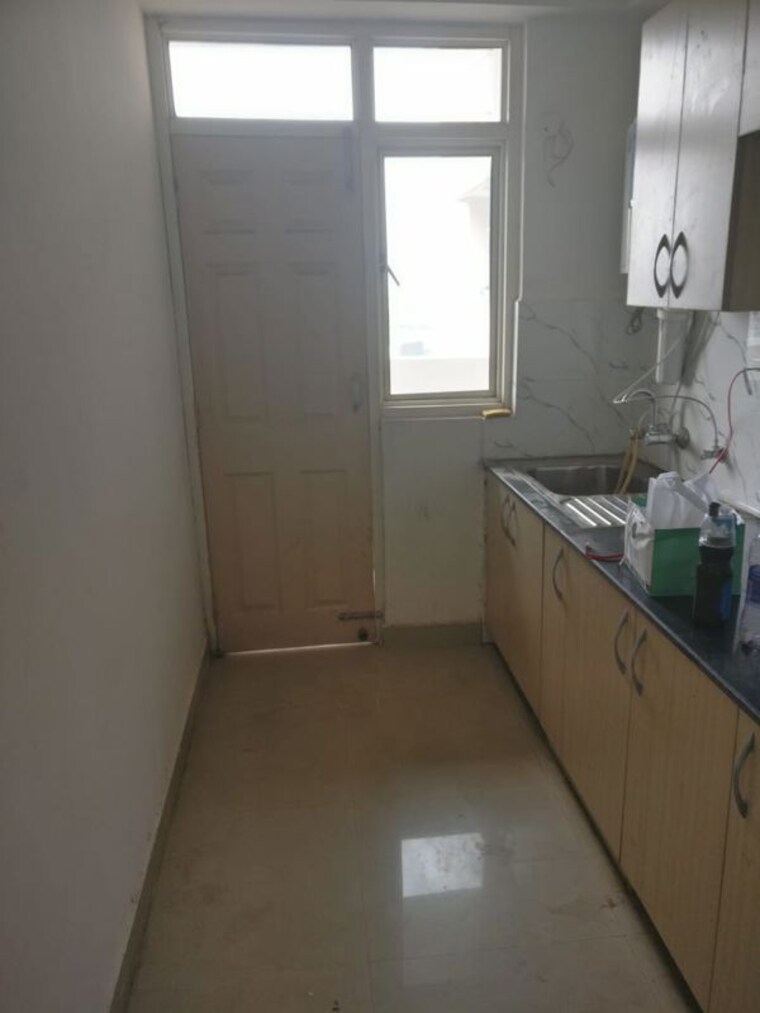 Kitchen, supertech-cape-town 2.5 Bedroom 1150 Sq.Ft. Apartment In Sector 74 Noida 9853762