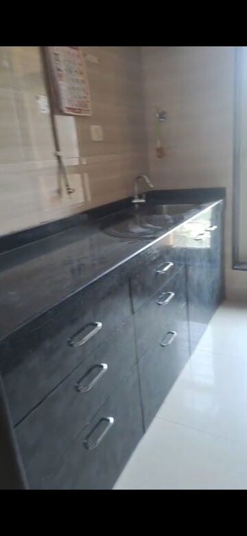 Kitchen in 2 BHK Apartment at Sheth Vasant Lawns, Laxmi Nagar – for Rent