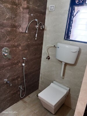 Bathroom in 2 BHK Apartment at Saaga Shri Sai Vishram CHS Ltd, Dahisar West – for Rent