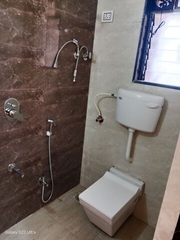 Bathroom in 2 BHK Apartment at Saaga Shri Sai Vishram CHS Ltd, Dahisar West – for Rent
