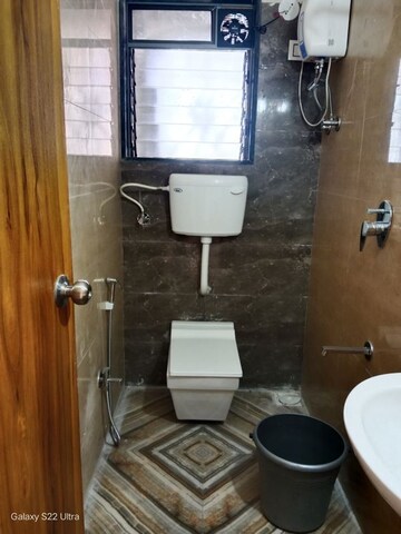 Bathroom in 2 BHK Apartment at Saaga Shri Sai Vishram CHS Ltd, Dahisar West – for Rent