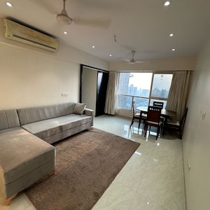 Living Room in 2 BHK Apartment at Supreme 19, Lokhandwala Complex – for Rent
