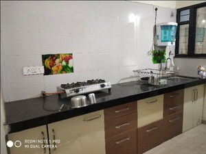 Kitchen in 2 BHK Apartment at Chandan Nagar – for Sale