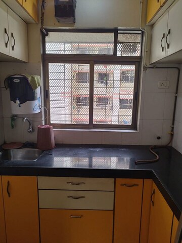 Kitchen in 1 BHK Apartment at Harmony Horizons, Ghodbunder Road – for Sale