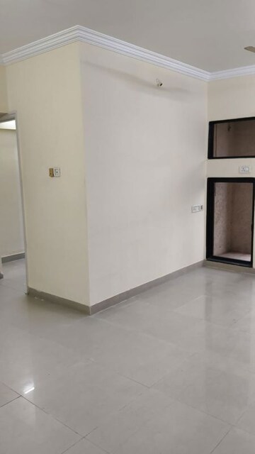 Room in 2 BHK Apartment at Swapnalok Towers, Malad East – for Rent