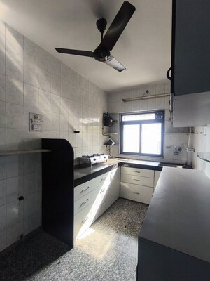 Kitchen in 2 BHK Apartment at Dholakia Apartment, Andheri East – for Rent