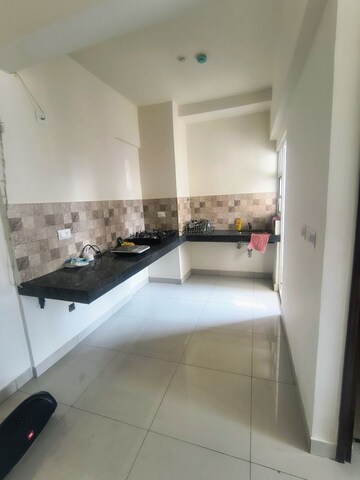 Kitchen in Studio Apartment at Puravankara Silversands, Mundhwa – for Rent