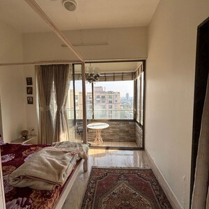 Bedroom in 3 BHK Apartment at Poseidon Apartment, Yari Road – for Rent