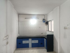 Kitchen in 2 BHK Apartment at Surobhi Park, Aundh – for Rent