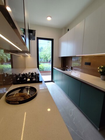 Kitchen in 3 BHK Builder Floor at Signature Global Daxin Vistas, Bhondsi – for Sale