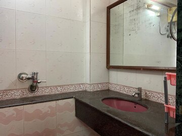 Bathroom in 2 BHK Apartment at Cosmic Heights, Bhakti Park – for Rent